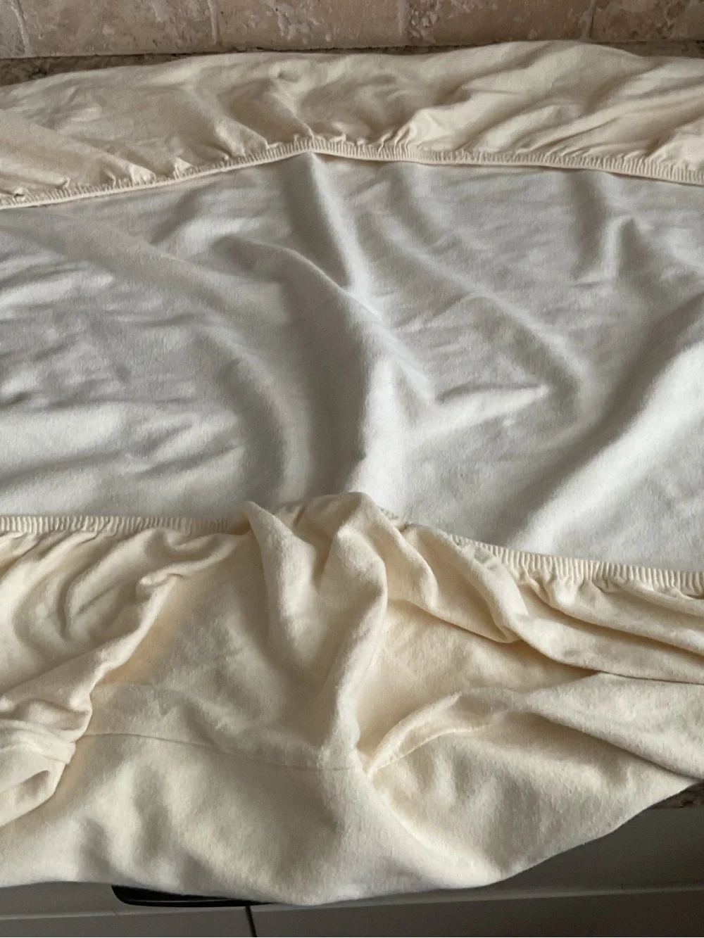 Organic cotton waterproof crib mattress protector by Naturepedic